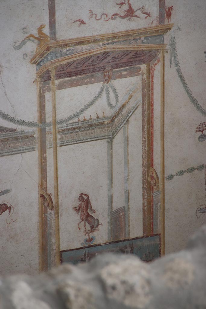 IX.12.A/IX.12.9 Pompeii. October 2024. 
Room 18, detail from upper east wall at south end. Photo courtesy of Klaus Heese.
